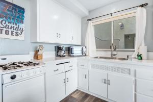 Amazing beachfront condo with deck, patio, & balcony