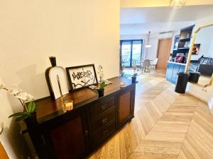 Urban comfort 1BR flat w terrace&parking