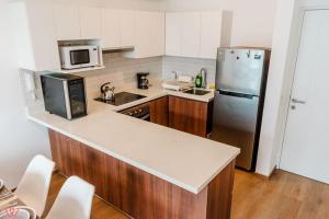 Bright 1BR with Gym and Chill Terrace