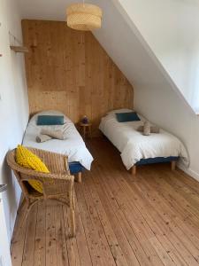 Maisons de vacances TY LOUIS vue mer Plages a 2 minutes a pieds : photos des chambres