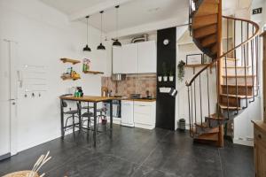 Appartements Le Distingue : photos des chambres