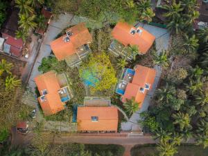 Kensho Villas Daisy with Private Pool Serene 5-BHK With Shared Pool & Lift, Near Popular Beaches by ELIVAAS