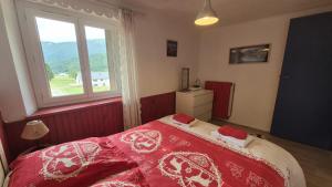 Chalets Le CHALET AUX CERFS : photos des chambres