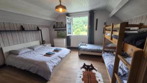 Chalets Le CHALET AUX CERFS : photos des chambres
