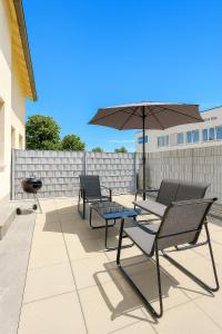 LETA Homes - Komfortables Gästehaus - eigene Parkplätze & Traumterrasse