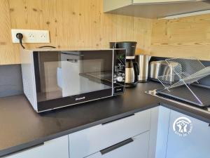 Maisons de vacances Chalet 23 Le Moulin, Camping de Coupeau, 4 personnes : photos des chambres