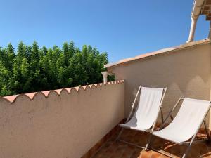 Sejours chez l'habitant Chambre douillette avec balcon a 7min de Vaison la Romaine : photos des chambres