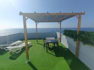 Studio avec terrasse et vue mer