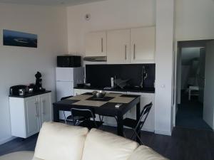 Les Locations du Bassin Appartements Alexandre : photos des chambres