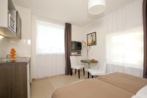 Appart'hotels Sejours & Affaires Massy Atlantis : photos des chambres