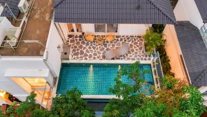 ELIVAAS Purple Coral Luxe 5-BHK Villa With Two Pvt Pools & Lift