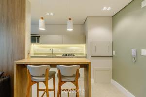 Apto c varanda no coração de Gramado - MLU0306