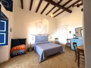 Casa Ajo e Didy, panorama sul mare a Malfa