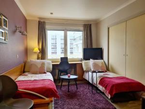 Appartements Park & Relax - Paris Expo Versailles : photos des chambres