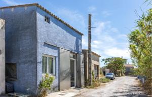 Maisons de vacances 1 Bedroom Amazing Home In Loupian : photos des chambres