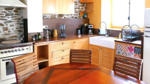 Appartements Chez Jasmine joli chapeau L-estive : photos des chambres
