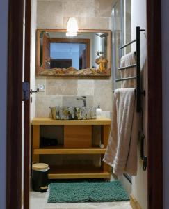 Appartements Chez Jasmine joli chapeau L-estive : photos des chambres