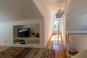 Bairro Alto Tiny Studio by Homing