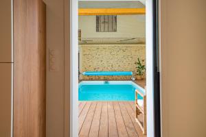 Maisons de vacances Grange de Clyna-Piscine & Spa a 10 min du circuit : photos des chambres