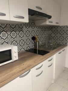 Appartements Warm and fully equipped studio : photos des chambres