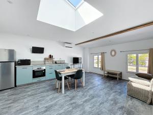 Appartements Les Magnolias - Charme et Confort au coeur du Blayais : photos des chambres