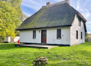 Ferienhaus mit Reetdach