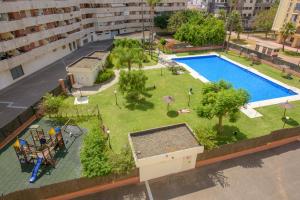 Céntrico con Piscina y Playa a 500 metros