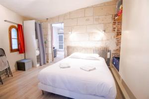 Appartements Le coeur de la ville : photos des chambres