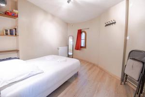 Appartements Le coeur de la ville : photos des chambres