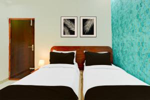 Super Hotel O Western Pride Hotel Bangalore Premier Taxi Services - OJO TAXI