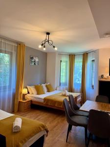 Maya Pokoje i Apartamenty