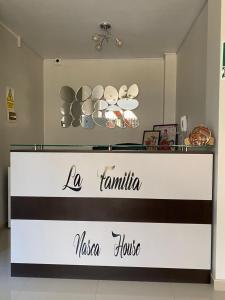 LA FAMILIA NASCA HOUSE