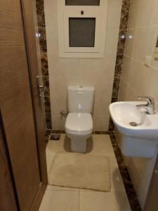 شقة دوبلكس مستوي فندقي بورتو كايرو التجمع الخامس عائليه704 c