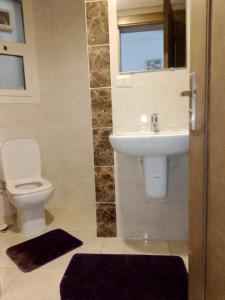 شقة دوبلكس مستوي فندقي بورتو كايرو التجمع الخامس عائليه704 c