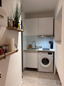 Appartements Studio cosy en centre ville : photos des chambres