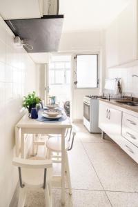 Vista para o Mar & Pé na Areia