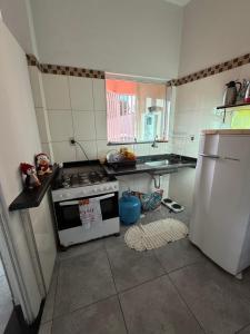 Casa a um Quarteirão do Santuário com garagem RECEPÇÃO 24 HORAS