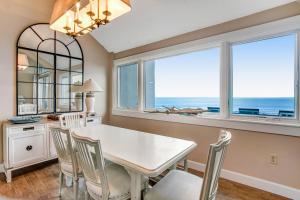 Ocean-view 4th-floor condo with balcony, outdoor pool & central AC