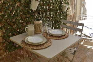 Appartements Escapade Ibiza Balneo & Terrasse : photos des chambres