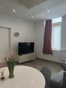 Appartements Cosy, Centre de Rosendael, HomyNest : photos des chambres
