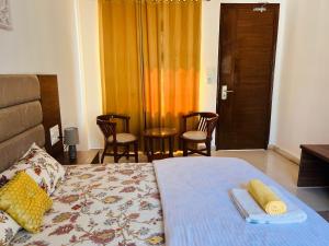Ima Ganga Hotel - Aesthetic, Quite Mountain View Rooms In Upper Tapovan with netflix, free airport pickup for 7 or more nights booking