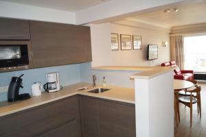 Seaview 2-bedroom Apartment Goldeneye with Private Garage in Duinbergen