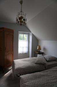 Maisons de vacances Maison au coeur du village Potier : photos des chambres