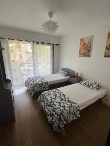 Appartements T3 Monica tout pres des plages : photos des chambres