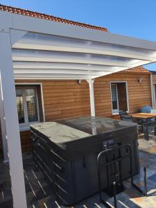 Maisons de vacances Gite de la perle rouge avec jacuzzi : photos des chambres