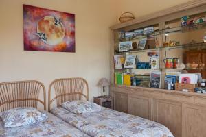 B&B / Chambres d'hotes Le Clos des Oliviers 188 chemin du Hameau des Bourges 06650 Le Rouret : Chambre Lits Jumeaux - Vue sur Jardin