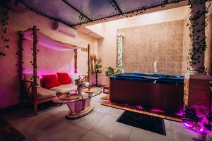 Appartements Casa Di Vibes - Jacuzzi - Sauna : photos des chambres