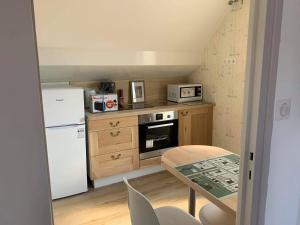 Appart'hotels Bristol Manor N20 terrasse cuisine et chambre : photos des chambres