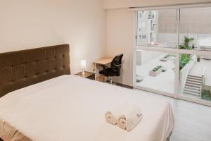 Stylish 2BR Apartment Balcony View