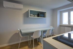 CAMERANOAPARTMENTS - Sopra la Piazza